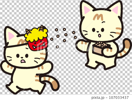 A brown tabby cat throws beans towards the demon mask during Setsubun. 107033437