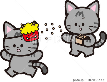 節分で鬼のお面に向かって豆をまくサバトラ猫 節分で鬼のお面に向かって豆をまくサバトラ猫 107033443