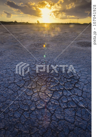 Broken dry soil in a Pampas lagoon, La Pampa province, Patagonia, Argentina. Broken dry soil in a Pampas lagoon, La Pampa province, Patagonia, Argentina. 107041928