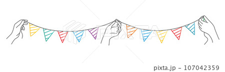 Hands holding drawn holiday bunting. Hands holding drawn holiday bunting. 107042359