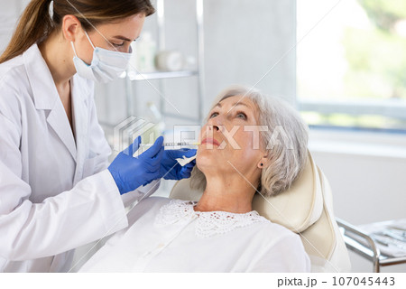 Facial injection mature patient Facial injection mature patient 107045443