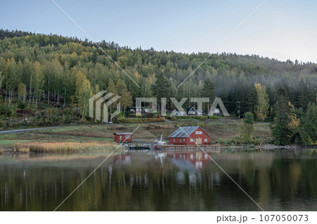 Swedish houses and mountain ant the sea at skuleberget campsite caravan camping in Hoga Kusten Sweden 107050073