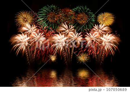 Colorful fireworks celebration and the night sky background. Colorful fireworks celebration and the night sky background. 107050689