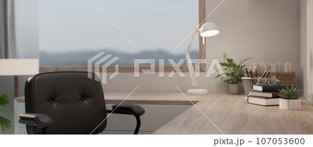 Close-up image of a copy space on a wooden corner table in a modern minimal home workspace Close-up image of a copy space on a wooden corner table in a modern minimal home workspace 107053600