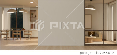 Minimal contemporary living room with blank wall in the middle of the room for mock up display. 107053617