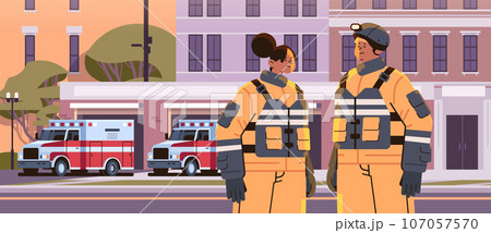 firefighters in uniform standing near fire station building department house facade and red emergency vehicles horizontal firefighters in uniform standing near fire station building department house facade and red emergency vehicles horizontal 107057570