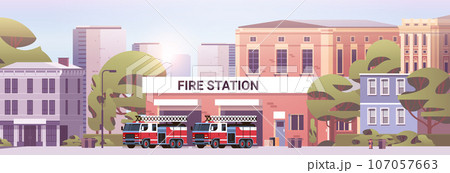 Fire station building fire department house facade and red emergency vehicle horizontal 107057663