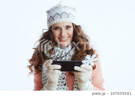 smiling stylish woman using phone 107059581