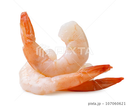 Peeled cooked shrimp close-up on a white background. 107060621