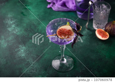 Purple fig cocktail or mocktail in glass Purple fig cocktail or mocktail in glass 107060978