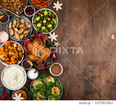 Christmas festive dinner with traditional dishes Christmas festive dinner with traditional dishes 107061062