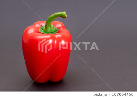 Red Bell Pepper on Black Background Red Bell Pepper on Black Background 107064456