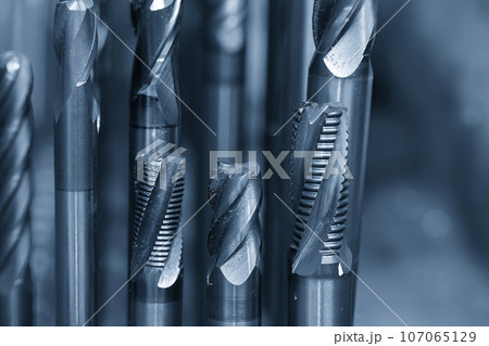 Close-up scene group of the used solid end mill. Close-up scene group of the used solid end mill. 107065129