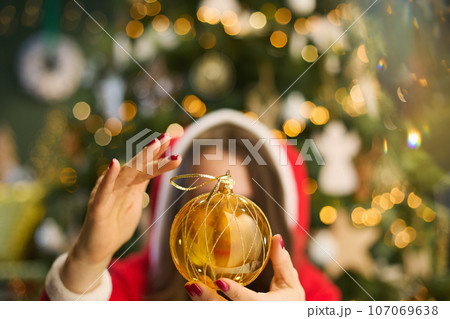 Elegant woman in living room woman witching with 107069638