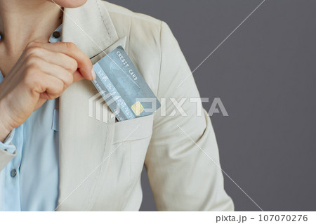 Modern business owner woman in light business suit 107070276