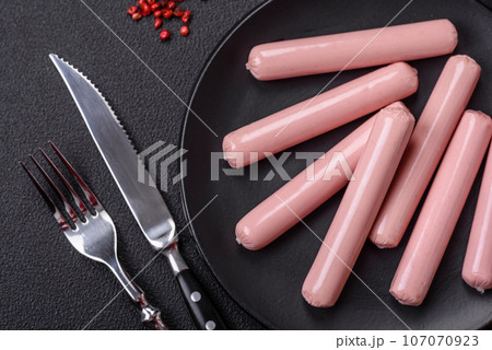 Delicious fresh vegetarian sausage or sausage made from vegetable protein tofu or seitan 107070923