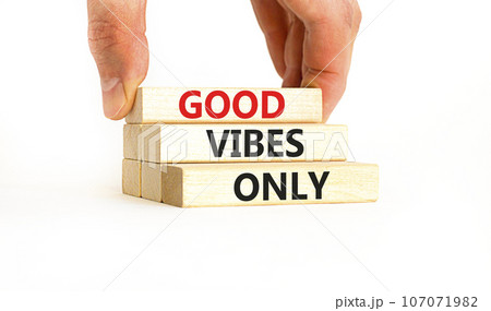 Good vibes only symbol. Concept word Good vibes only on beautiful wooden block. Businessman hand. Beautiful white table white background. Business motivational good vibes only concept. Copy space. 107071982