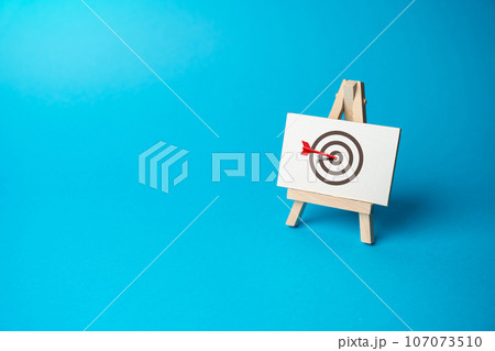 The red arrow hits the center of the target. Right on target on the first try. Advertising, marketing and targeting. Clear and specific goals. Accurate decisions. Archery. Striving for excellence The red arrow hits the center of the target. Right on target on the first try. Advertising, marketing and targeting. Clear and specific goals. Accurate decisions. Archery. Striving for excellence 107073510