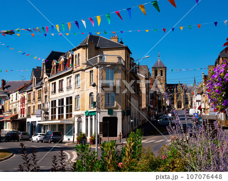 Summer view of Rethel streets overlooking Saint-Nicolas Church in background Summer view of Rethel streets overlooking Saint-Nicolas Church in background 107076448