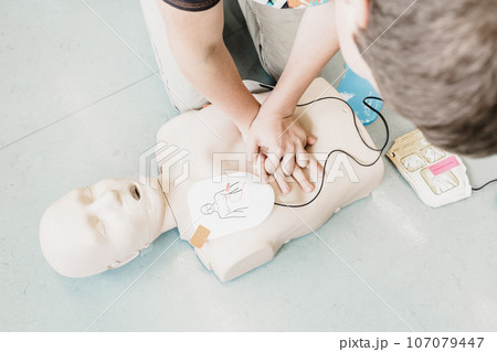 First aid cardiopulmonary resuscitation course using automated external defibrillator device, AED. 107079447