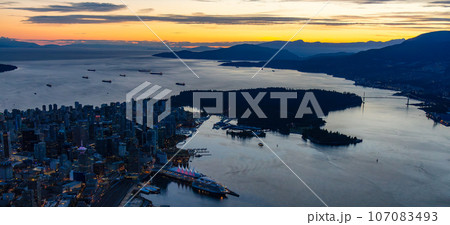 Aerial View of Downtown Vancouver at night after Sunset. British Columbia, Canada Aerial View of Downtown Vancouver at night after Sunset. British Columbia, Canada 107083493