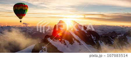Air Balloon Flying in Canadian Rocky Mountain Landscape Aerial Nature Background. Air Balloon Flying in Canadian Rocky Mountain Landscape Aerial Nature Background. 107083514