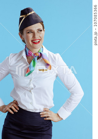 stewardess smiling modern female stewardess on blue...の写真素材 [107085366] - PIXTA