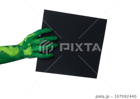 PNG, zombie hands holding a sheet of black paper, isolated on white background. PNG, zombie hands holding a sheet of black paper, isolated on white background. 107092440