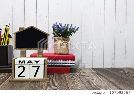 May 27th calendar date text on white wooden block on wooden desk May 27th calendar date text on white wooden block on wooden desk 107092567