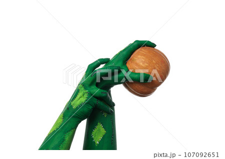 PNG, green zombie hands holding a pumpkin, isolated on white background. PNG, green zombie hands holding a pumpkin, isolated on white background. 107092651