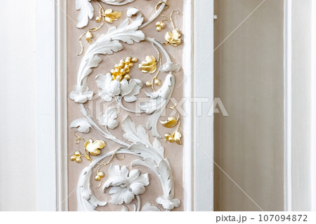 Classic luxury interior details, white vine and golden grapes 107094872