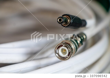close-up coaxial connectors cable for Transmitting TV, CCTV, and High Speed Internet. Broadband. Selective Focus close-up coaxial connectors cable for Transmitting TV, CCTV, and High Speed Internet. Broadband. Selective Focus 107096542