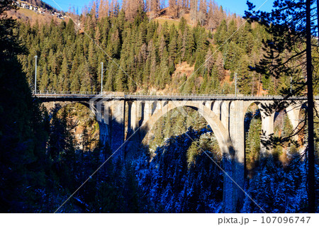 View of Wiesen Viaduct, Rhaetian railway, Graubunden in Switzerland at winter 107096747