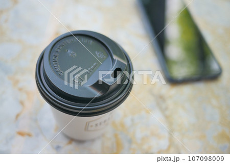 Blank take away kraft coffee cup on table , Blank take away kraft coffee cup on table , 107098009