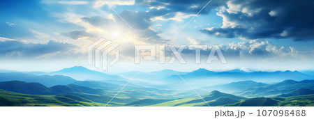 Beautiful aerial View of hilly landscape in morning mist with sun rays, banner format 107098488
