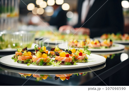 Catering buffet food. Delicious colorful fish and vegetable appetizers. Celebration Party Catering buffet food. Delicious colorful fish and vegetable appetizers. Celebration Party 107098590