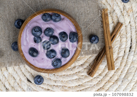 blueberry yogurt with the addition of ripe blueberries 107098832