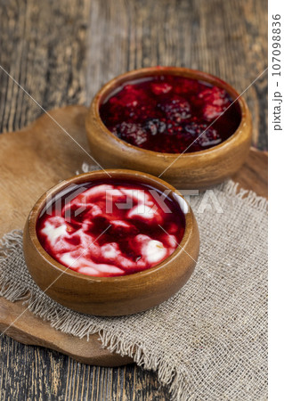 fresh cow's milk yogurt with blackberries and raspberries , dairy products fresh cow's milk yogurt with blackberries and raspberries , dairy products 107098836