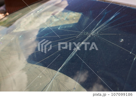 Broken car windshield. Accident of car. Selective focus. Broken car windshield. Accident of car. Selective focus. 107099186