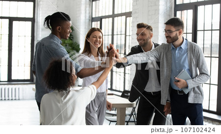 Overjoyed diverse colleagues engaged in teambuilding activity at meeting Overjoyed diverse colleagues engaged in teambuilding activity at meeting 107102424