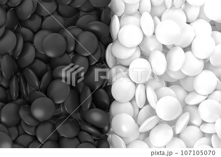 黒と白に分かれた碁石や薬のような沢山の敷き詰められた3Dオブジェクト 107105070