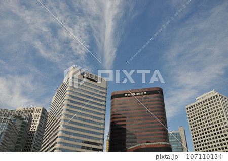 Office buildings and blue sky near Namdaemun Market and Seoul station in mid Autumn. 107110134