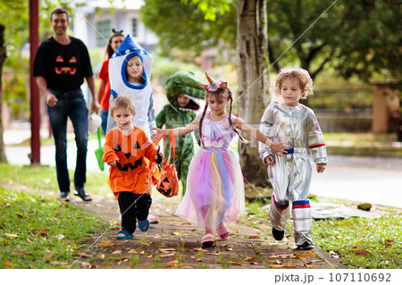 Kids trick or treat. Halloween fun for children. 107110692