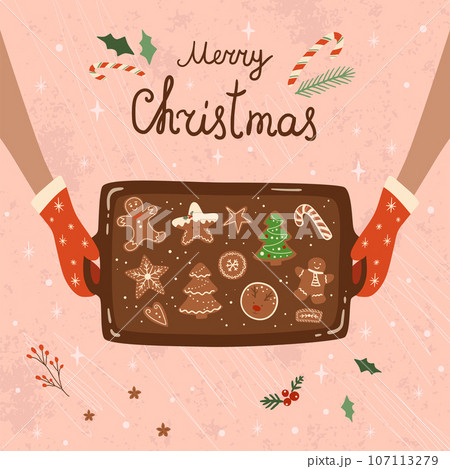 Baking tray with Christmas cookies card. Hands holding oven tray with different types of gingerbreads. Cute baked Christmas cookies. Baking tray with Christmas cookies card. Hands holding oven tray with different types of gingerbreads. Cute baked Christmas cookies. 107113279