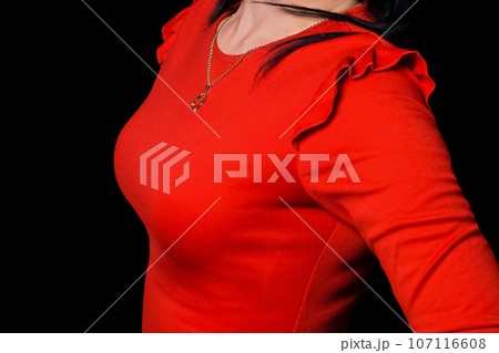 Adult woman fashion and clothing style in red dress breaston black background 107116608