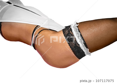 Female erotic skinny body attractive dark stockings leg on white background isolated 107117075