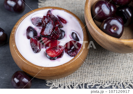 fresh cow's milk yogurt with cherry berries, dairy products 107120917
