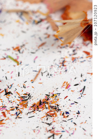 shavings and pieces of lead on paper after sharpening pencils shavings and pieces of lead on paper after sharpening pencils 107120923