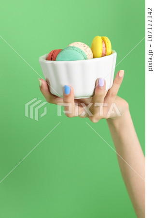 Hand with Macaroons 107122142