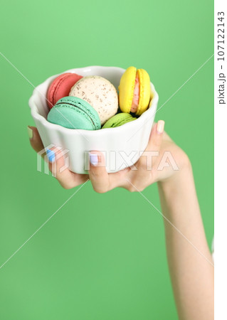 Hand with Macaroons 107122143